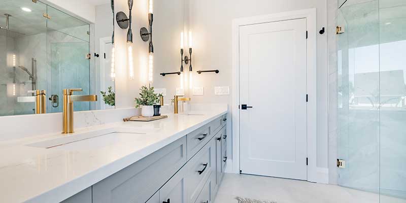 This layout adds tailored cabinetry such as under sink drawers and cabinets 